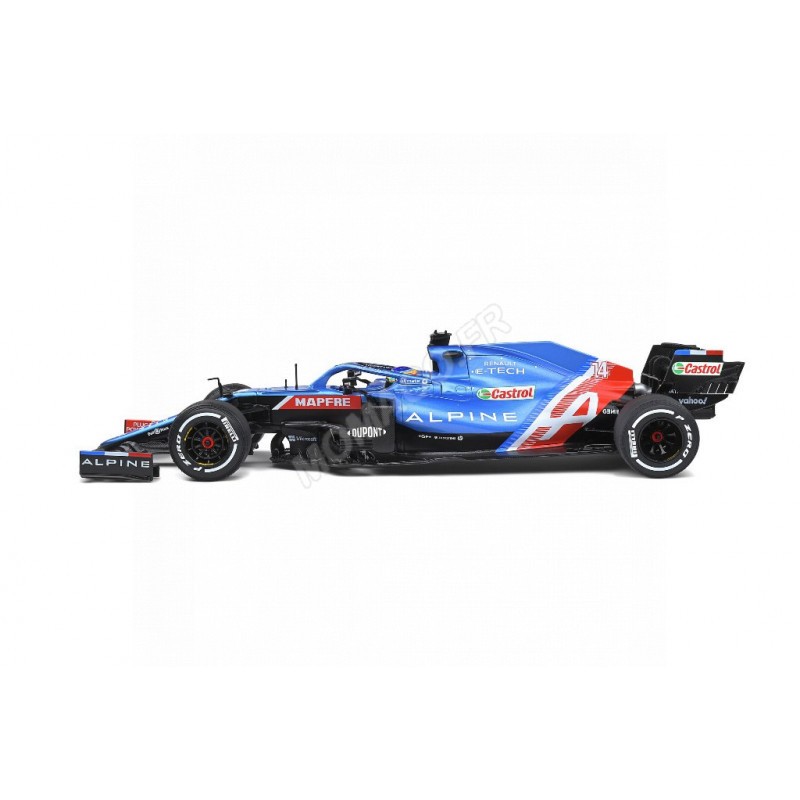 Figurine miniature humoristique d'une voiture de Formule 1 avec pilote