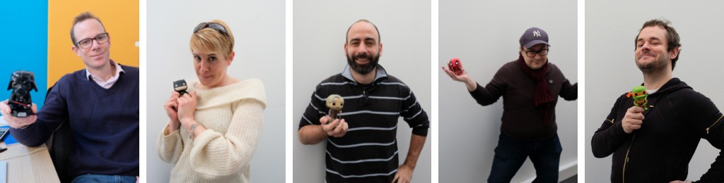 Une photo des membres de notre équipe tenant chacun une figurine Funko Pop dans la main.